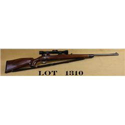 Custom bolt-action sporting rifle on 98  military mauser action. Unmarked to caliber.  Weatherby sco