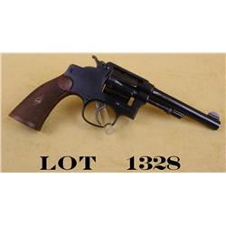 Smith & Wesson .32 caliber hand-ejector, 4”  barrel, blue finish, checkered wood grips,  serial #404