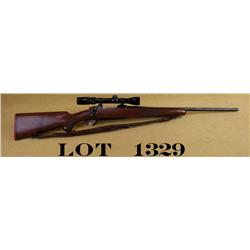 Ruger model 77 bolt-action sporting rifle,  .22-250 caliber, Bushnell 3x9power scope, QD  sling swiv