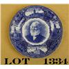 Image 1 : Flo blue souvenir plate showing Henry  Longfellow at center along with State of  Maine landmarks. Ma