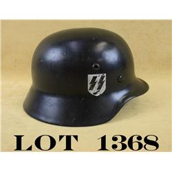 German Model 42 helmet with leather liner in  overall good condition with later applied  emblems.   