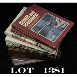 Small lot of seven reference books including  The Winchester Book by Madis (signed by the  author), 