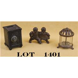 Lot of three early metal banks including a  safe style with considerable black finish  remaining, ap