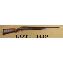 Winchester Model 1897 pump action, takedown  shotgun, 16 gauge, 28” barrel, blue finish,  wood stock