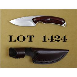 Buck hunting knife with Buck sheath, approx.  8” overall with an approx. 3-1/2” blade in  like new c