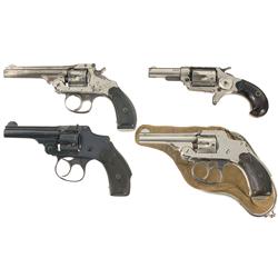 Three Smith & Wesson and One Colt Revolver