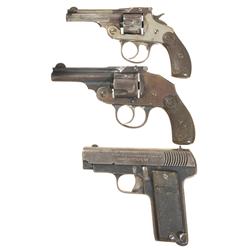 Two Revolvers and One Pistol