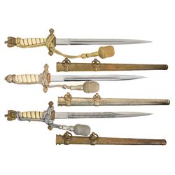 Three Kriegsmarine Daggers with Sheaths and Portapees