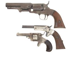 Two Revolvers and One Pistol