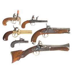 One Flintlock Tinder Lighter and Five Antique Pistols