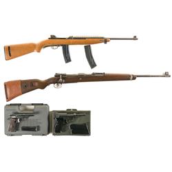 Two Military Handguns and Two Military Long Guns