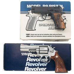 Two Boxed Handguns