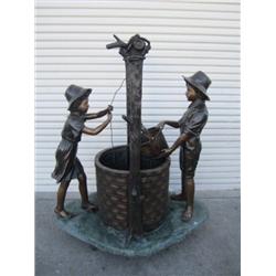 A10-1 BRONZE BOY AND GIRL ON WELL FOUNTAIN