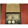 Image 1 : "The Silver Story" 1 Mint silver certificate, 2 BU Silver dollar coins, and silver granules