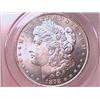 Image 1 : 1878-CC Morgan Dollar MS63 PCGS Brilliant with a little gold near the rims.