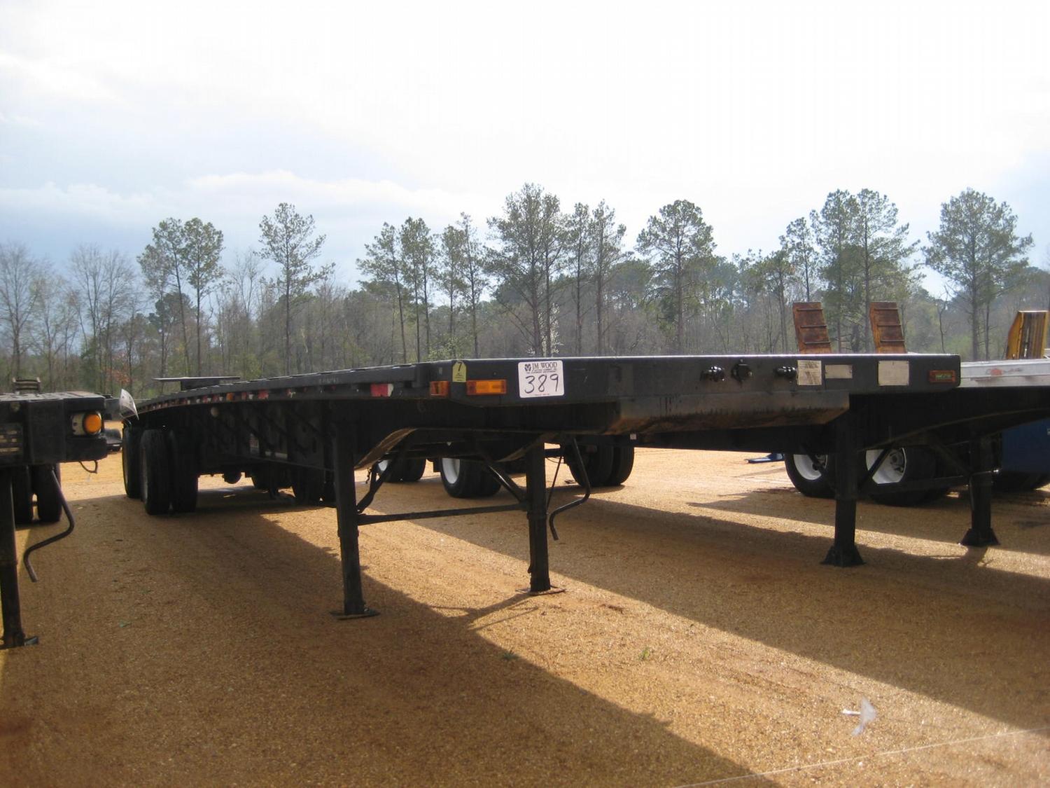 1995 TRANSCRAFT 48' SPREAD AXLE FLATBED TRAILER