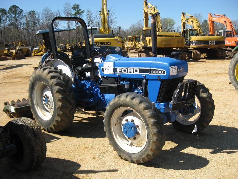 FORD 3930 4X4 FARM TRACTOR J.M. Wood Auction Company, Inc.