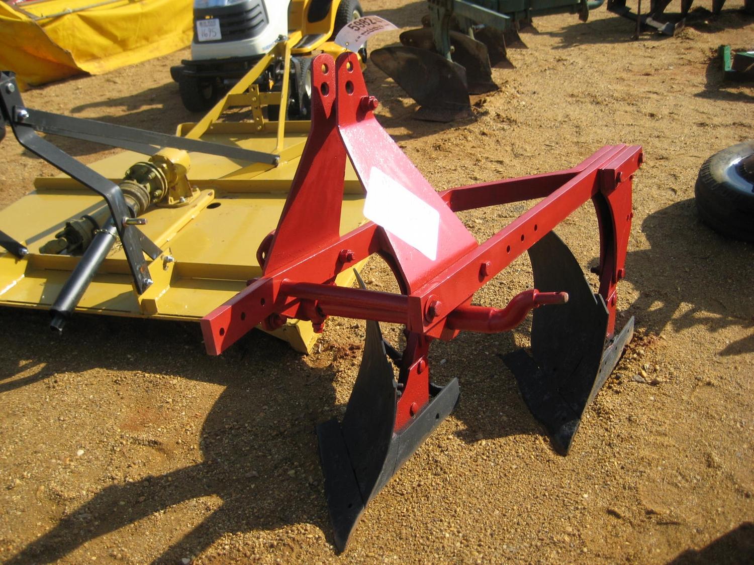 2 ROW BOTTOM PLOW J.M. Wood Auction Company, Inc.