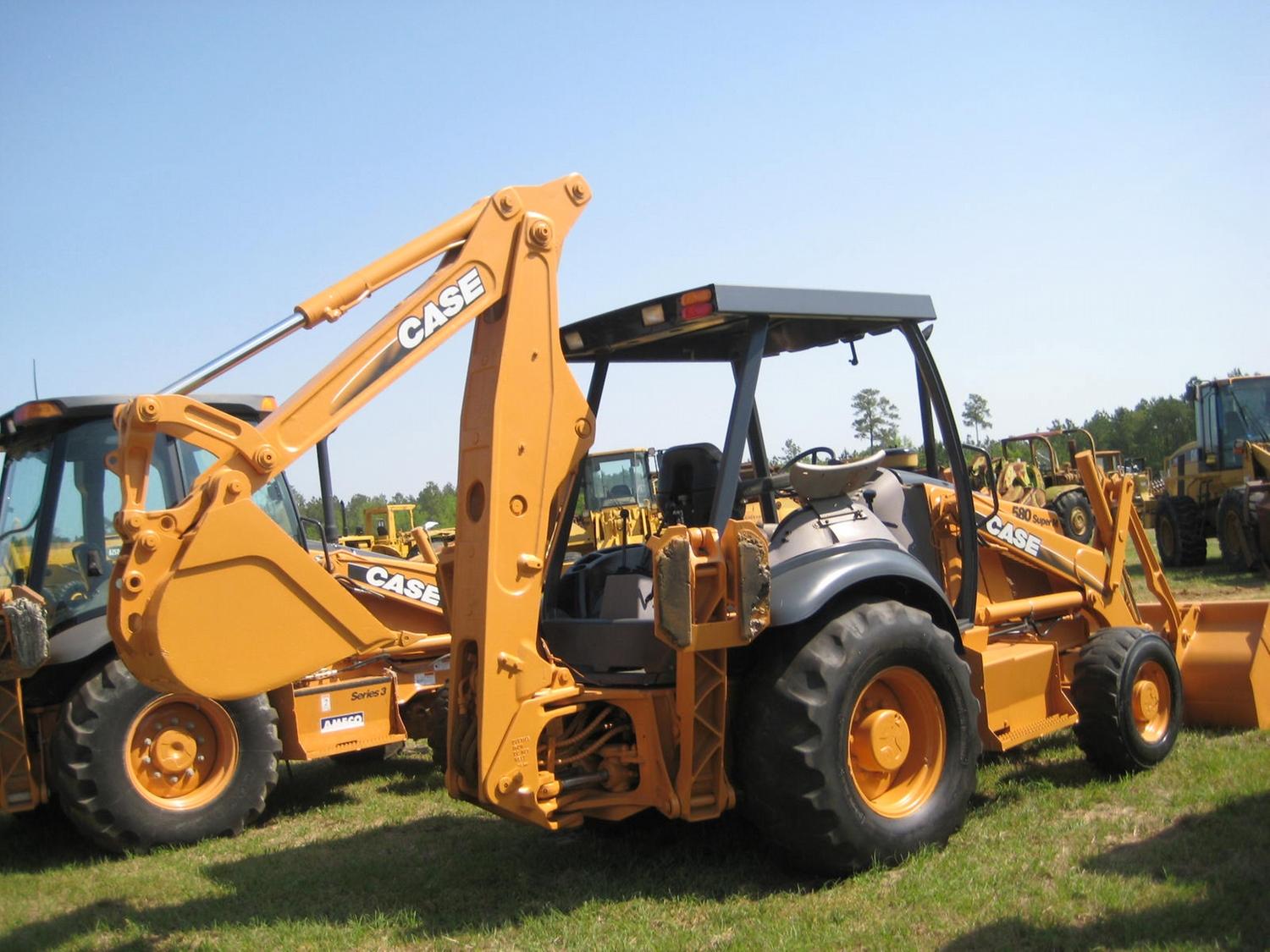 580sm CASE 580SM 4X4 LOADER BACKHOE - J.M. Wood Auction Company, Inc.