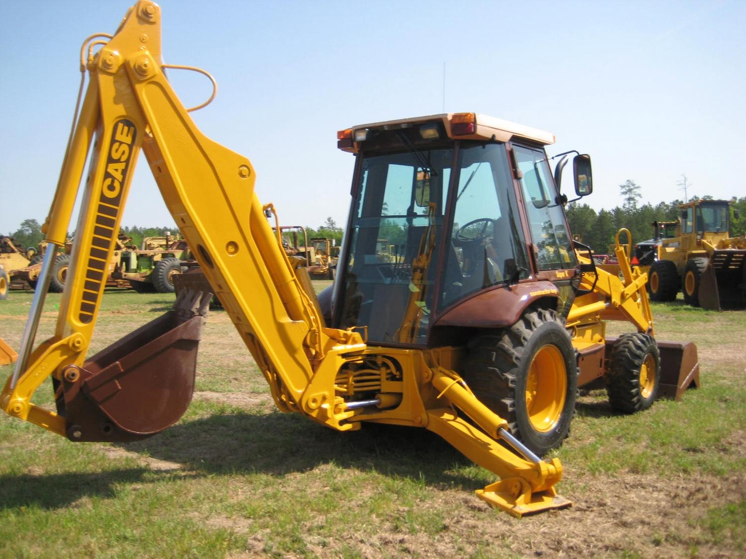 CASE 580SK 4X4 LOADER BACKHOE J.M. Wood Auction Company, Inc.