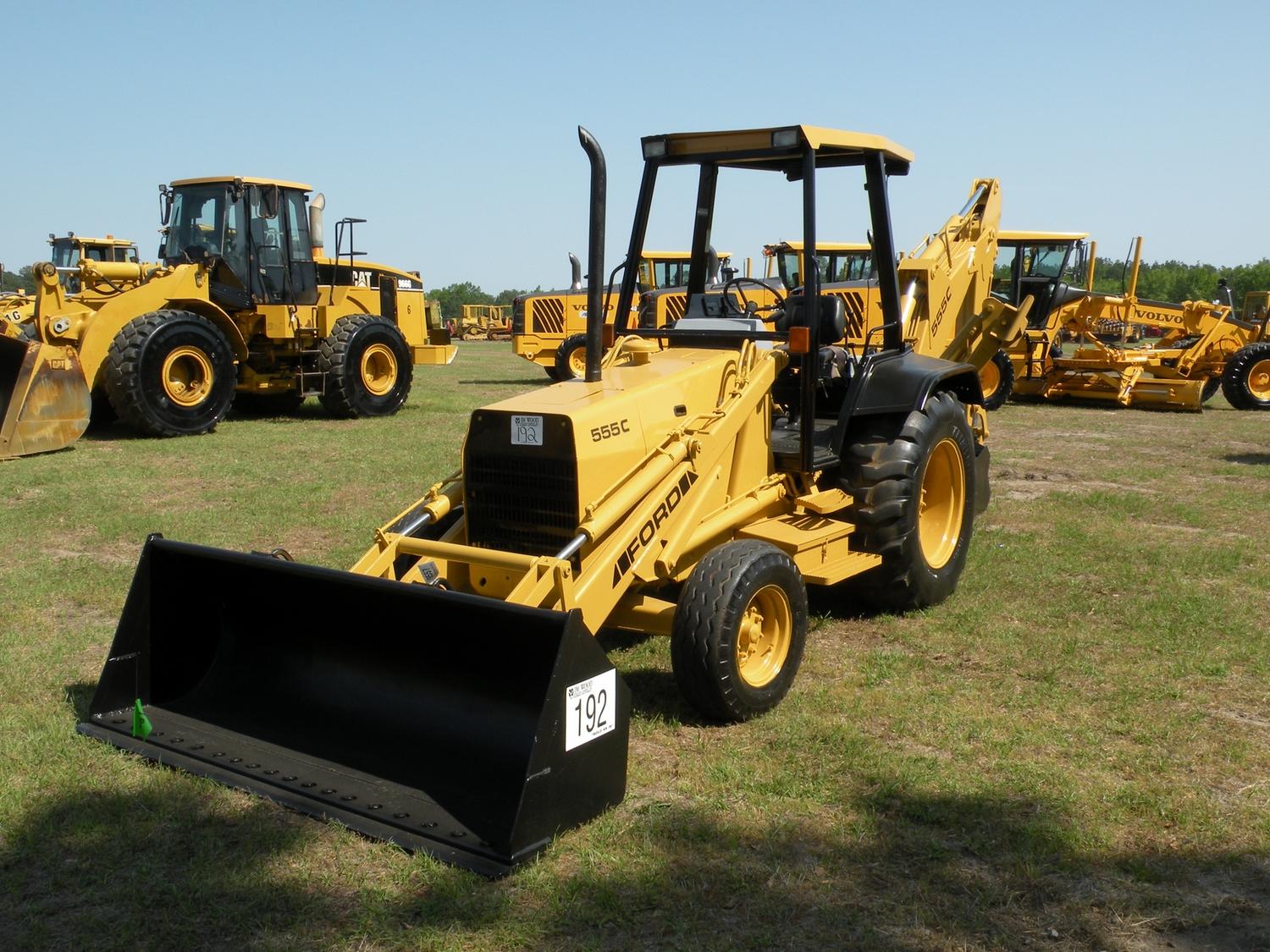 FORD 555C LOADER BACKHOE J.M. Wood Auction Company, Inc.