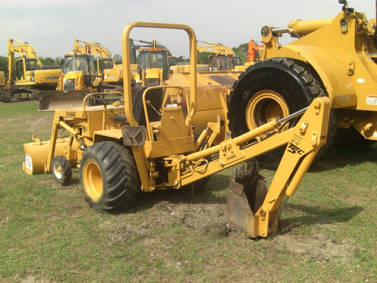 TERRAMITE T5C LOADER BACKHOE J.M. Wood Auction Company, Inc.