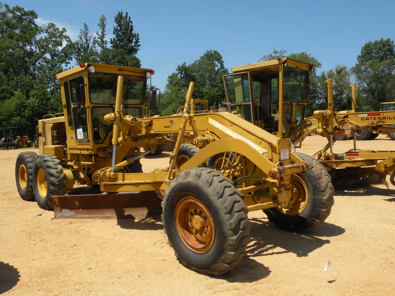 CAT 12G MOTOR GRADER J.M. Wood Auction Company, Inc.