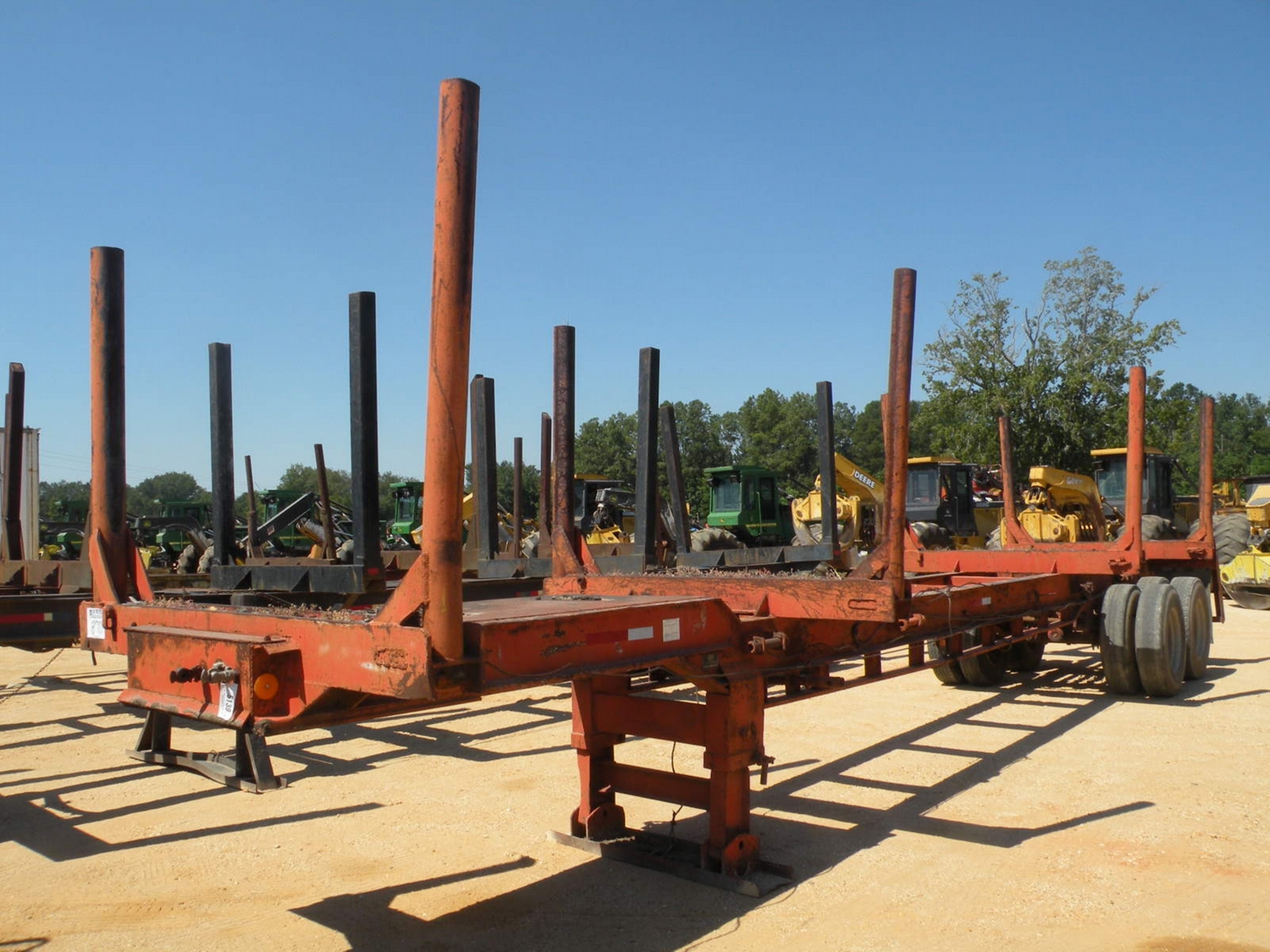 1969 ALABAMA 4 BOLSTER LOG TRAILER - J.M. Wood Auction Company, Inc.
