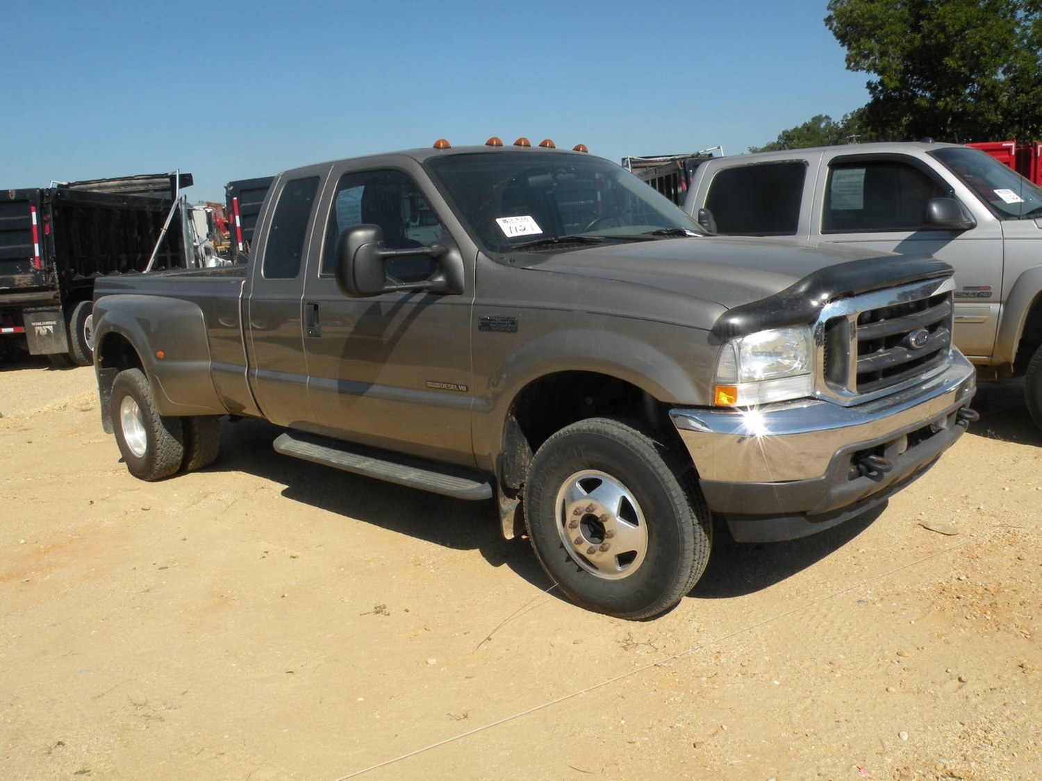 2002 FORD F350 4X4 EXTENDED CAB DUALLY J.M. Wood Auction Company, Inc.