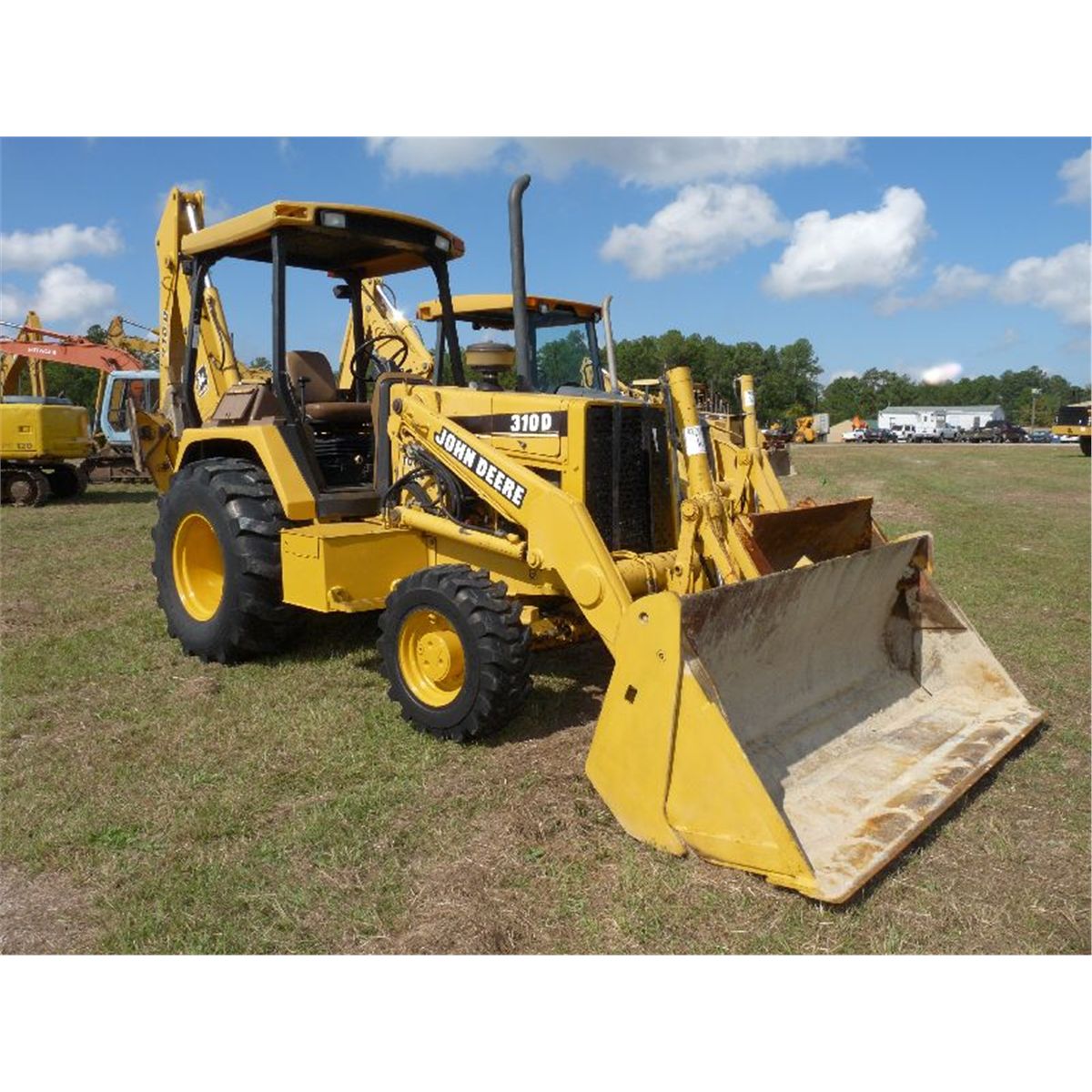 JOHN DEERE 310D 4X4 LOADER BACKHOE J.M. Wood Auction Company, Inc.