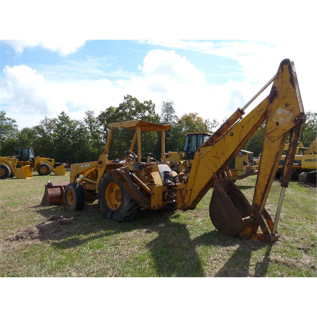 JOHN DEERE 510 LOADER BACKHOE J.M. Wood Auction Company, Inc.