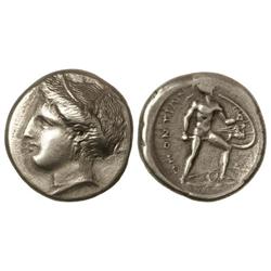 Estátera. 369-338 a.C. LOKRIS OPUNTIA. Anv.: Cabeza de Perséfone a izquierda. Rev.: Ajax en marcha a