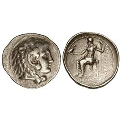Tetradracma. 336-323 a.C. ALEJANDRO MAGNO. Anv.: Cabeza de Hércules con piel de león a derecha. Rev.