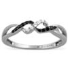 Image 1 : 10 Karat White Gold Ring with sparkling Black and White round diamonds