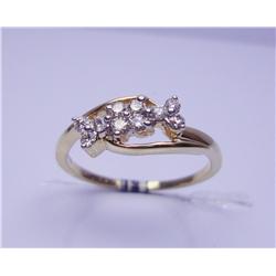 18 Karat Gold Diamonds Ring. .27 Carat Diamonds 2.75 Grams Weight