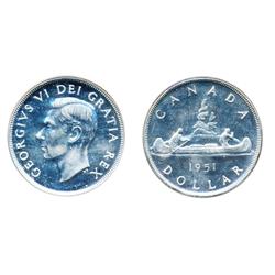 1951. Arnprior.  PCGS graded Mint State-64.  Another fully brilliant and lustrous dollar.