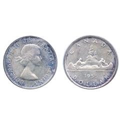 1955.  ICCS Mint State-65.  Light to medium heavy blue and purple toning.  Another gem.