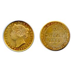 1885.  PCGS graded AU-55.  Golden toning.