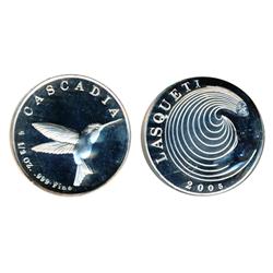 Lasqueti Mint.  1997/2007.  Obv: LASQUETI/1997/2007. Frog.  Rev: CASCADIA. 1/2 oz. .999 Fine. Hummin