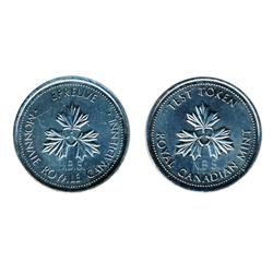 TEST Token.  $1.00.  CH-TT-100.1.  Round Large size.  Three Maple Leaves.  1983.  Counterstamped 'N.
