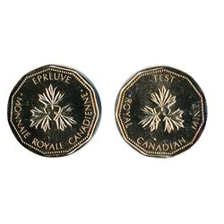 TEST Token.  $1.00.  CH-TT-100.12.  Gold plated on nickel.  11 sided. Narrow rims.  Mint State-63.