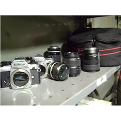 LOT - of 2 NIKON BODIES FA and FE2, 4 LENES AND CAMERA BAG