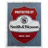 Image 1 : PROTECTED BY SMITH AND WESSON METAL SIGN - Approx.