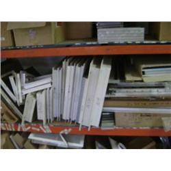 SHELF OF GRILLS/COVERS/REGISTER