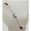 Image 1 : 14K GOLD AND GEMSTONE LADIES BRACELET 1.3GRAMS - A