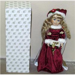 CHRISTMAS CAROLINE PORCELAIN DOLL - HERITAGE SIGNA