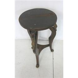 Biedermier style end table with carved swans