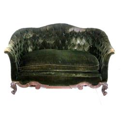Victorian carved loveseat with tufted back