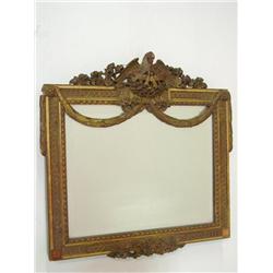 Carved mirror with bird on top