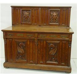 Oak figural sideboard